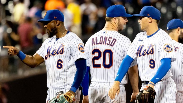 Mets' right fielder Starling Marte, first baseman Pete Alonso and...