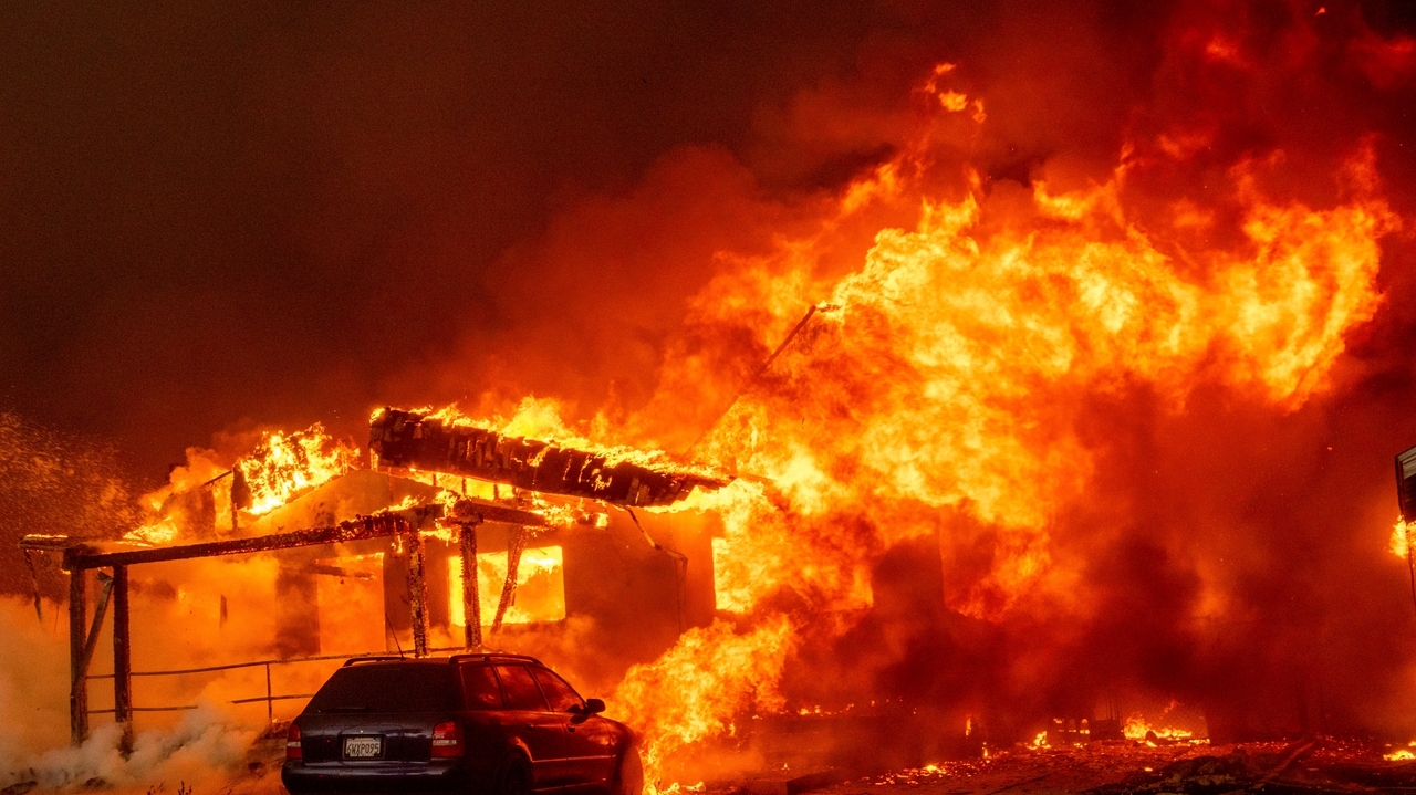 Wildfires latest: Tens of thousands ordered to evacuate as fires tear ...
