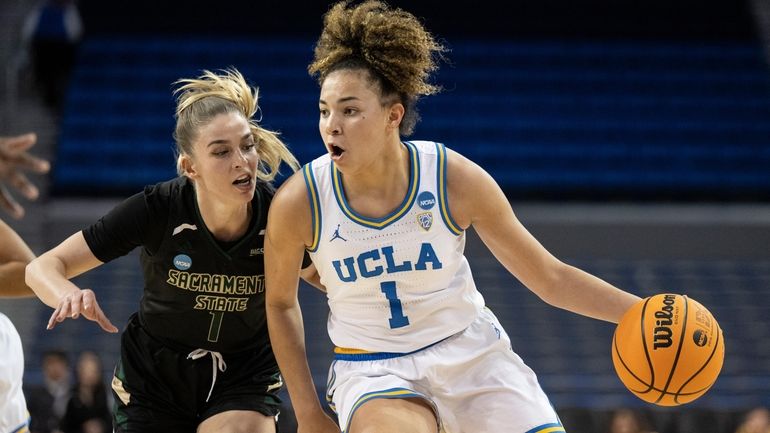 UCLA guard Kiki Rice, right, drives as Sacramento State guard...