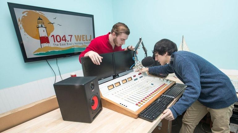 Andrew Adams, left, promotions manager of WELJ 104.7 FM and...