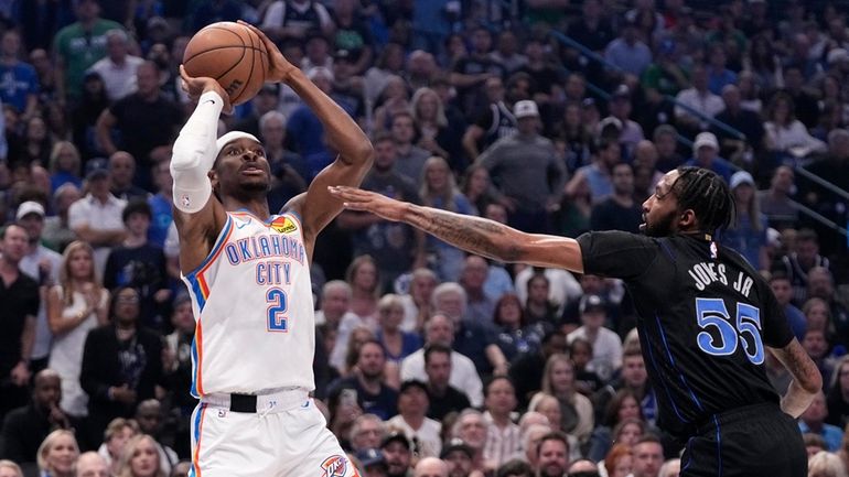 Oklahoma City Thunder guard Shai Gilgeous-Alexander (2) shoots over Dallas...