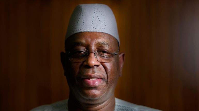 Senegal President Macky Sall poses during an interview with The...