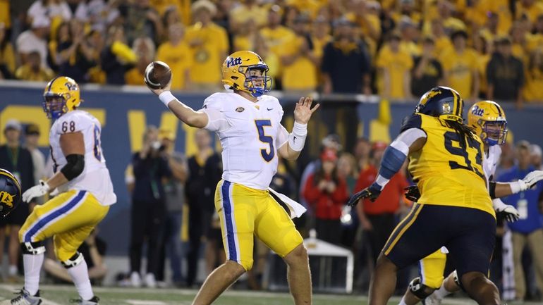 Pittsburgh quarterback Phil Jurkovec (5) attempts a pass during the...