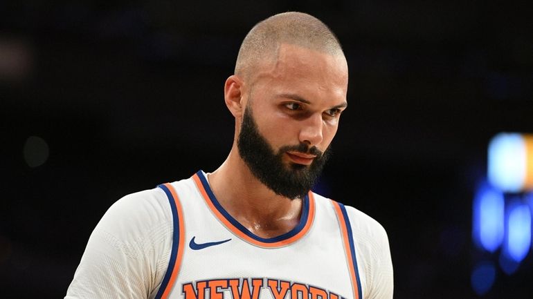 Knicks guard Evan Fournier looks on against the Boston Celtics...