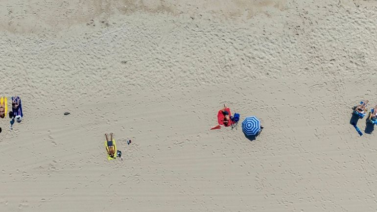 A quiet Coopers Beach on Tumbleweed Tuesday in Southampton on...