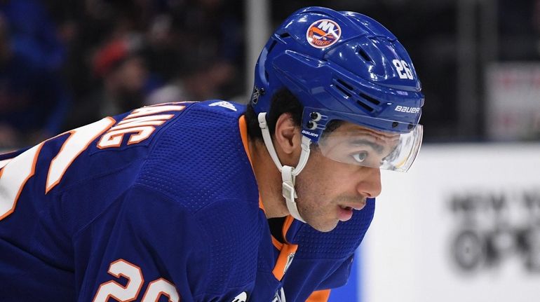 Islanders right wing Josh Ho-Sang looks on before a faceoff...