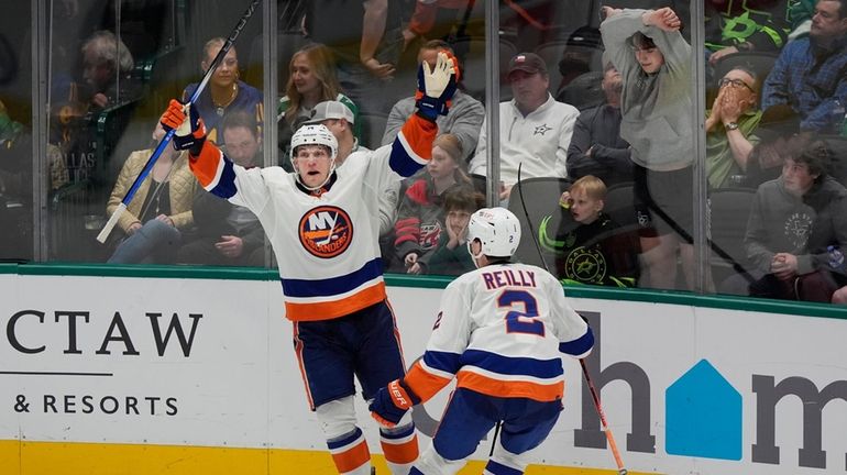 Islanders center Bo Horvat (14) celebrates after his overtime winning...