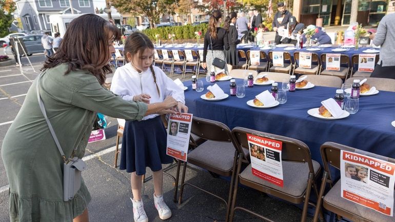 Olivia Shapiro, 8, of Woodmere, and her grandmother Cindy Gelnick...