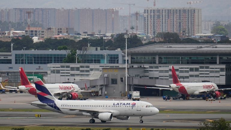 A plane taxis on the runway after landing at El...