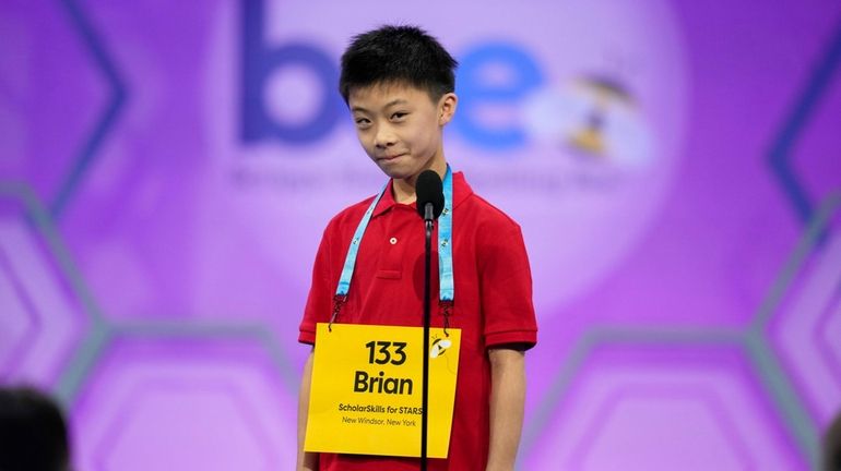 Brian Liu, 11, of Great Neck, competes in the Scripps National Spelling...