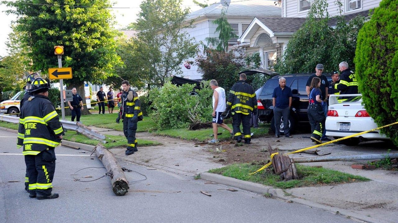 New Hyde Park crash topples pole, injures driver, officials say Newsday