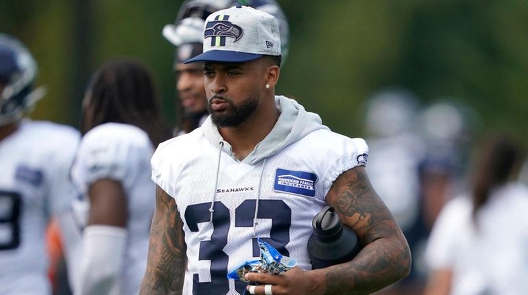 Seattle Seahawks strong safety Jamal Adams watches during training camp...