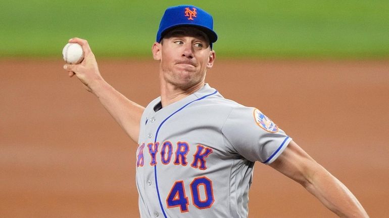 Chris Bassitt of the Mets throws a pitch during the first inning...