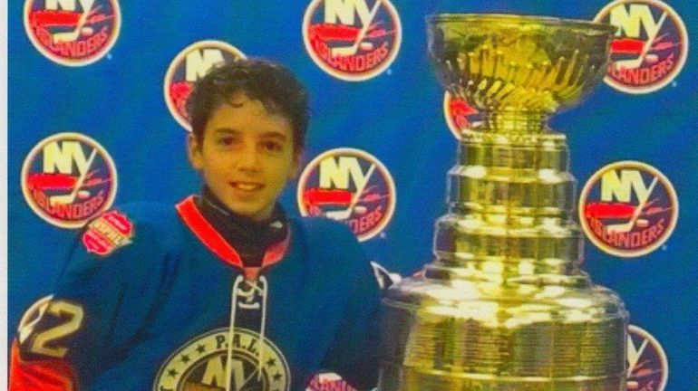 Kidsday reporter Alex Bedard with the Stanley Cup.