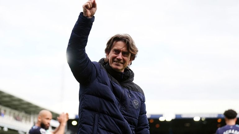 Brentford manager Thomas Frank celebrates following the English Premier League...