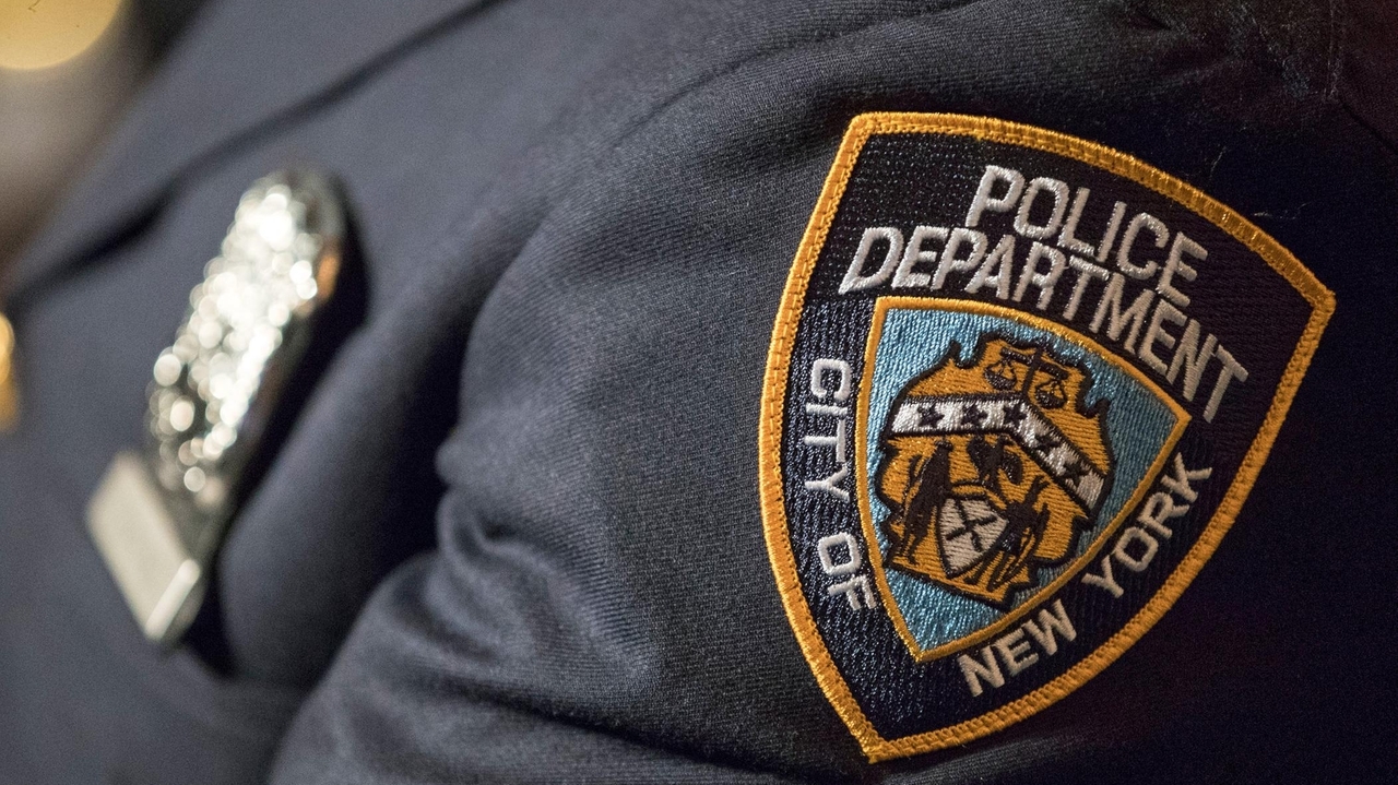 NYPD says officer who guards mayor's home is suspended after shooting a man while off duty