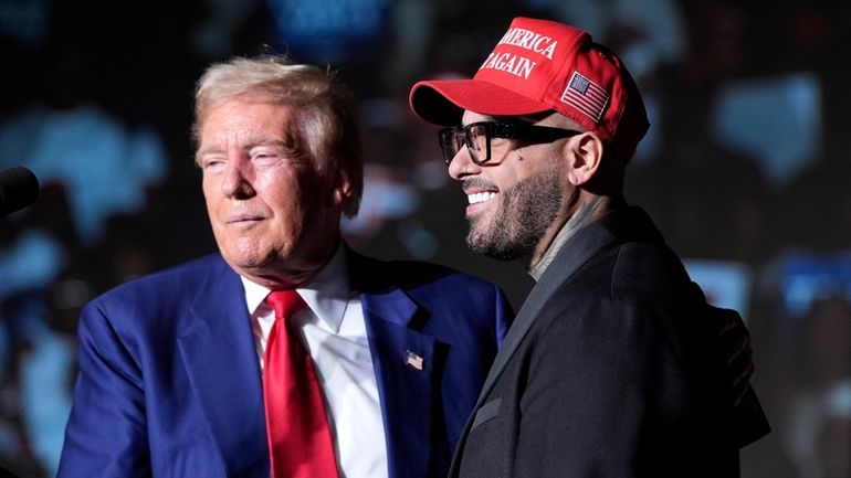 Republican presidential nominee former President Donald Trump, left, greets Nicky...