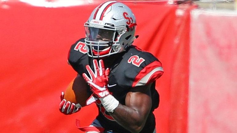 Stony Brook defensive back Travon Reid-Segure intercepts a pass against...