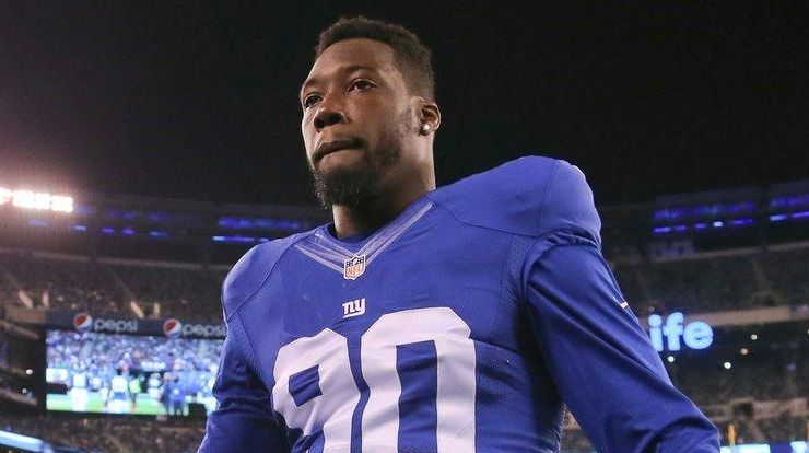 New York Giants defensive end Jason Pierre-Paul greets fans before...