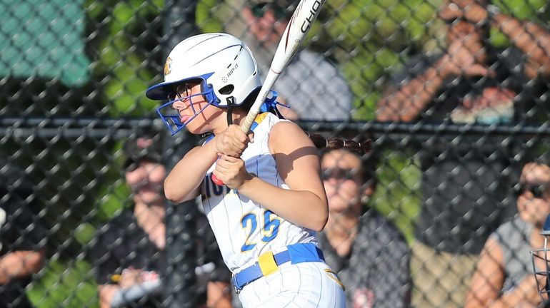 West Islip's Alexa Ficalora (25) rips a shot to left...