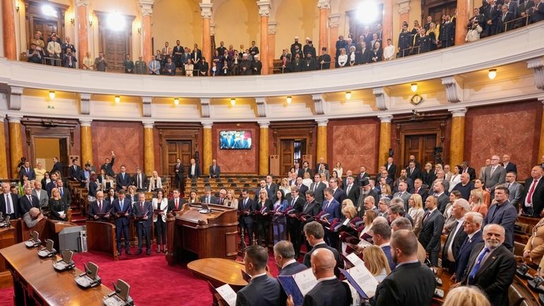 Serbia's new Prime Minister Milos Vucevic and ministers of the...