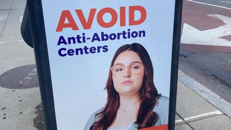 A sign deterring people from going to "anti-abortion centers" is...