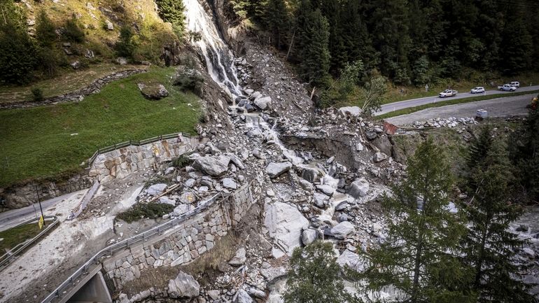 A road is blocked in Saasal, Switzerland, Friday, Sept. 5,...