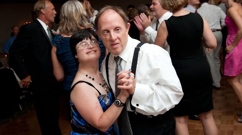 Michael Kaminski dances with his longtime girlfriend, Patti Denove.