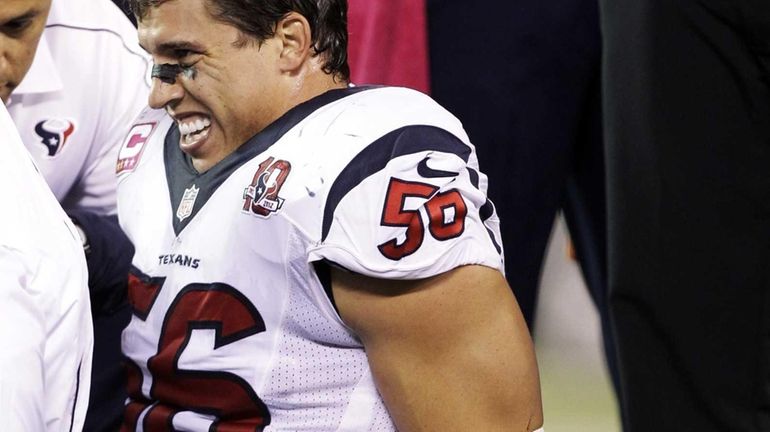 Brian Cushing injures left knee again on another low block