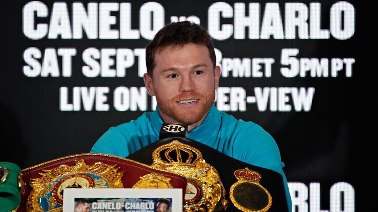 Canelo Alvarez, of Mexico, speaks during a news conference Wednesday,...