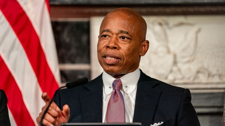 Mayor Eric Adams speaks during a press conference at City...