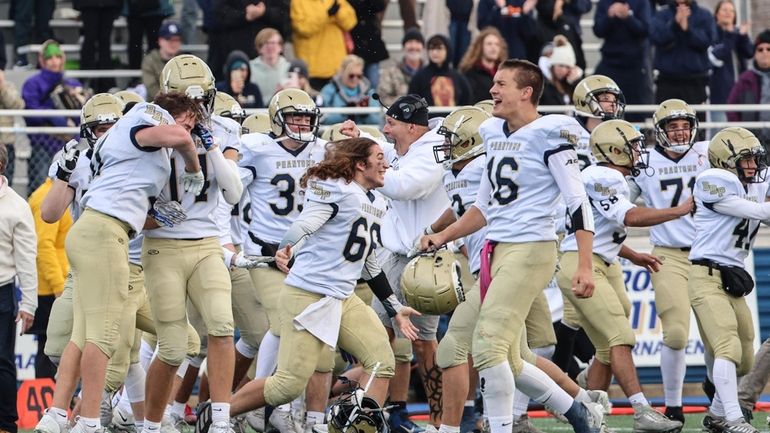 Bayport-Blue Point celebrates their 35-7 win of the Long Island...