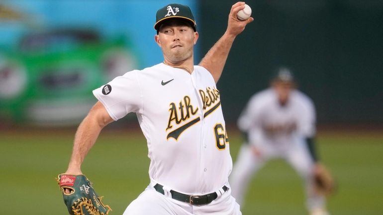 Oakland Athletics pitcher Ken Waldichuk works against the Detroit Tigers...