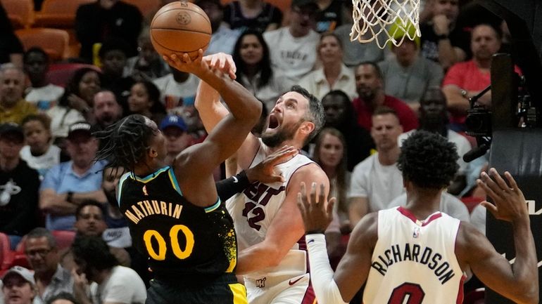 Indiana Pacers guard Bennedict Mathurin (00) is fouled by Miami...