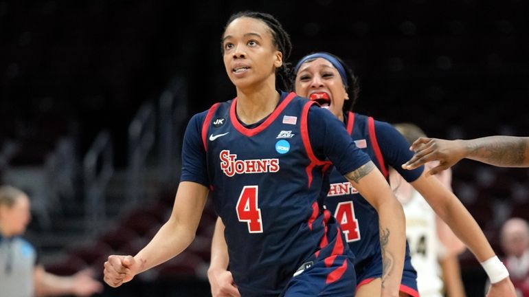 St. John's guard Jayla Everett reacts after hitting the game-winning...