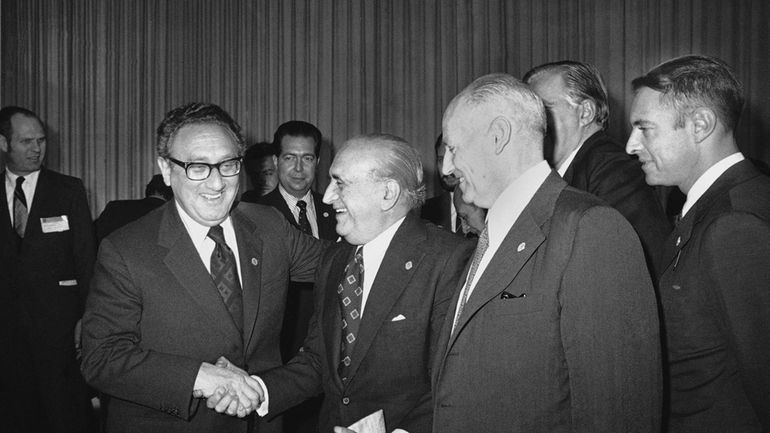 U.S. Secretary of State Henry Kissinger greets Argentina's Foreign Minister,...