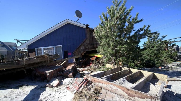 A home damaged by superstorm Sandy in Atlantique on Fire...