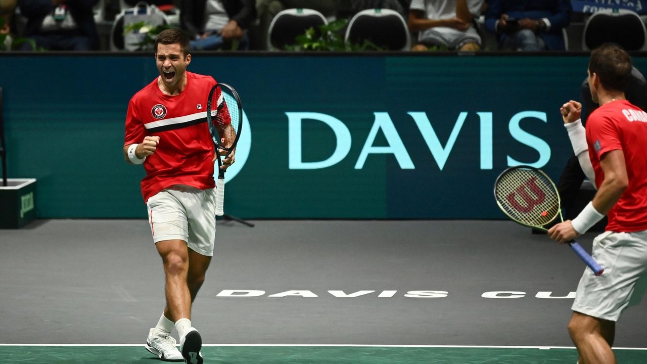 Canada beats Italy to start Davis Cup title defense