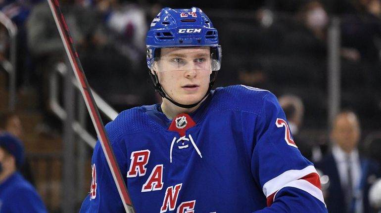 Rangers right wing Kaapo Kakko looks on against the Lightning...