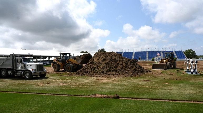 Heavy equipment is used to repair the Grand Prix Ring...