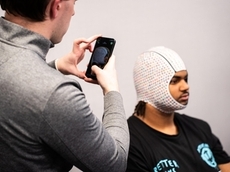 Long Island high school football players fitted for All-Star Classic uniforms