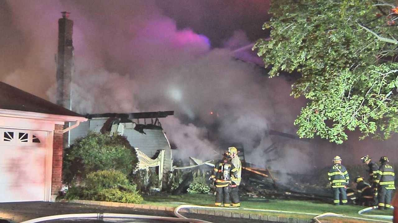 Four injured in St. James house fire early Sunday, authorities say