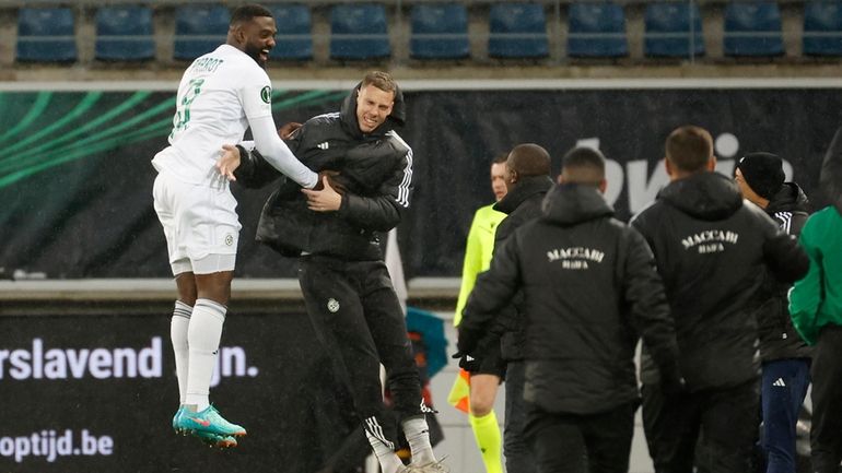 Maccabi Haifa's Frantzdy Pierrot, left, celebrates after scoring his side's...