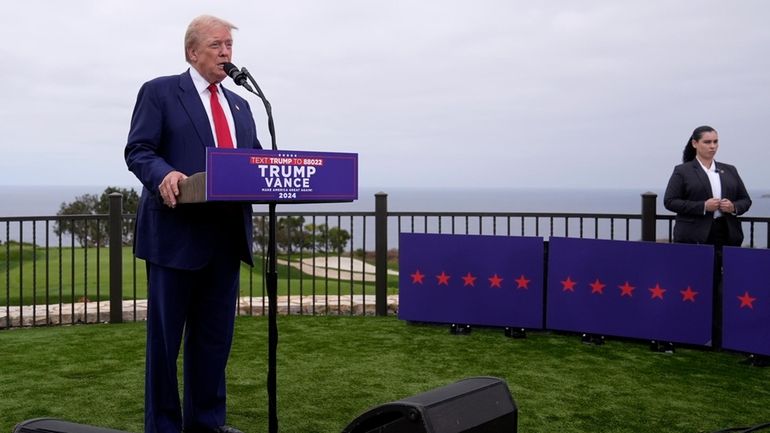 Republican presidential nominee former President Donald Trump speaks during a...