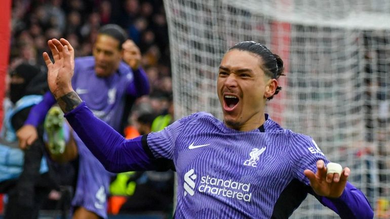 Liverpool's Darwin Nunez celebrates after scoring his side's opening goal...