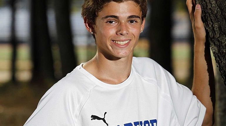 Comsewogue varsity soccer player James Thristino poses for a portrait....