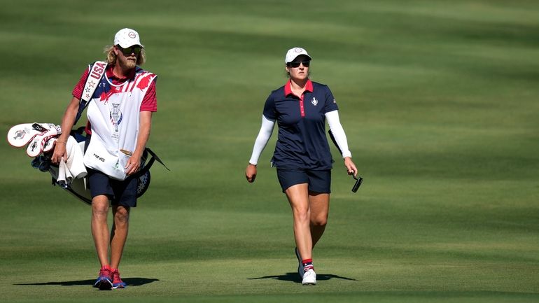 United States' Ally Ewing walks on the 16th hole during...