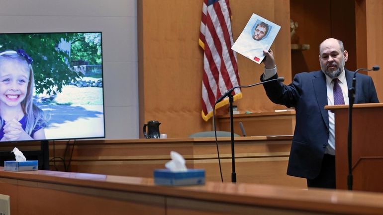 Senior Assistant New Hampshire Attorney General Benjamin Agati shows the...