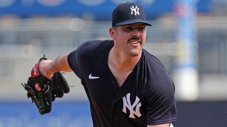 The Yankees' Carlos Rodon throws live batting practice during spring...