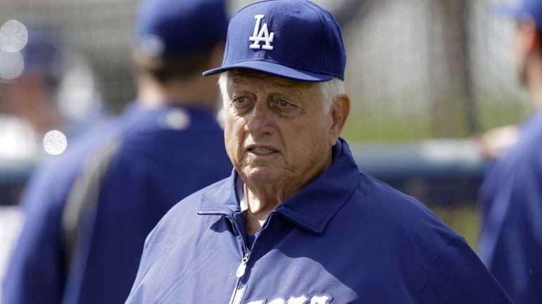The Los Angeles Dodgers' Tommy Lasorda looks on during a...